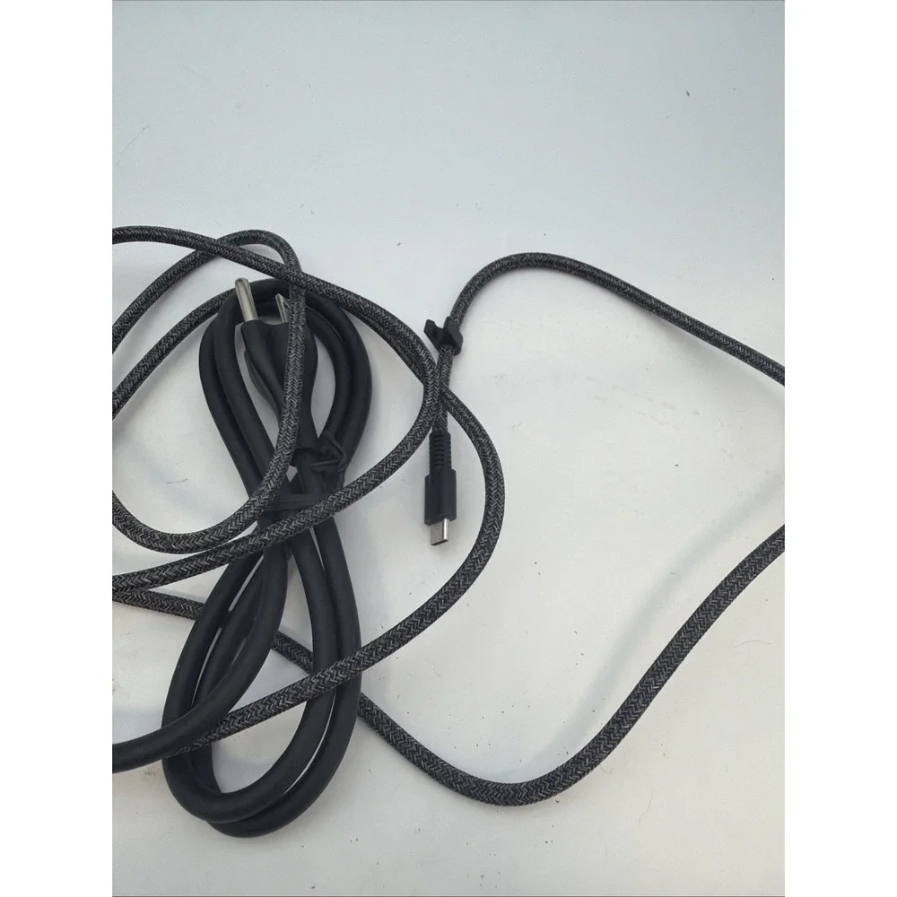 genuine HP 65W USB-C AC adapter.